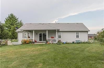 Huge covered back patio for star gazing and family dinners!