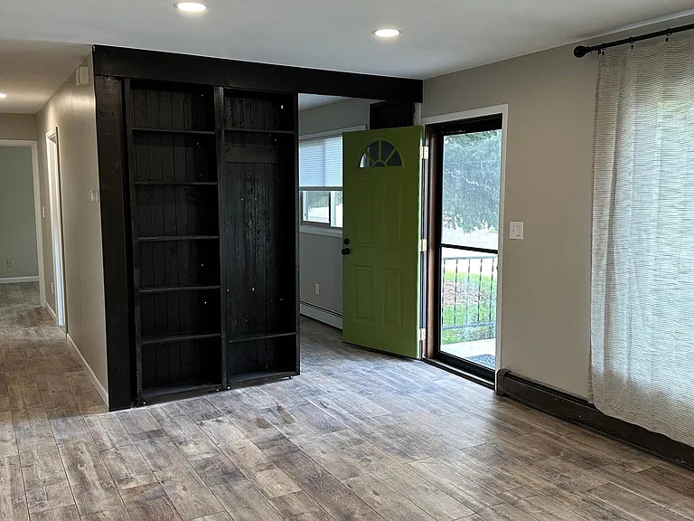 Movable bookcase/coat rack