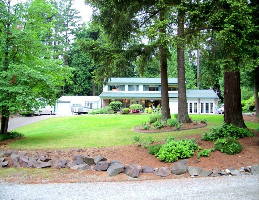 This lovely home is set back off the street for optimal privacy!  