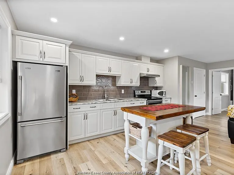 845 Old Tecumseh Rd #UPPER — Photo 4
