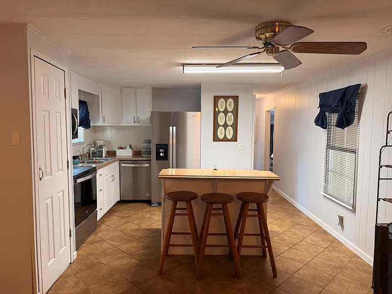 Kitchen all new stainless steel appliances, Kitchen island with bar stools