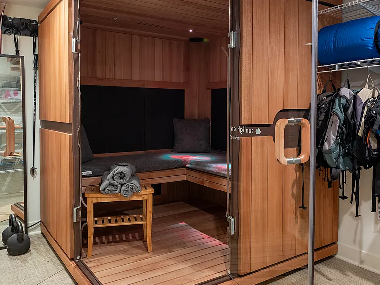 Infared sauna seats 4+ people; integrated ipad for workouts or relaxing music.