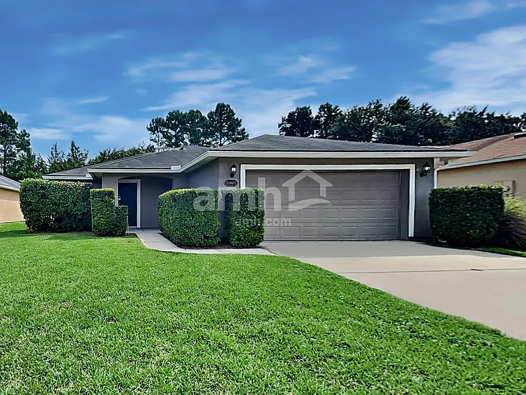 12607 Wooded Bluff Ct — Photo 1