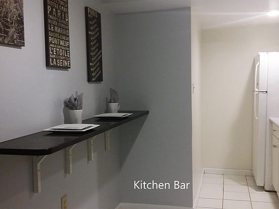 Kitchen with granite breakfast bar