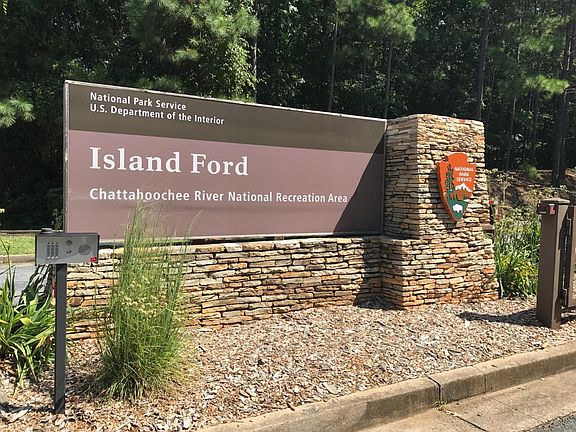 Across street from walking trails & river