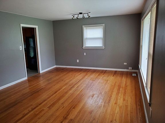 Sliding pocket door connects living room to the kitchen.