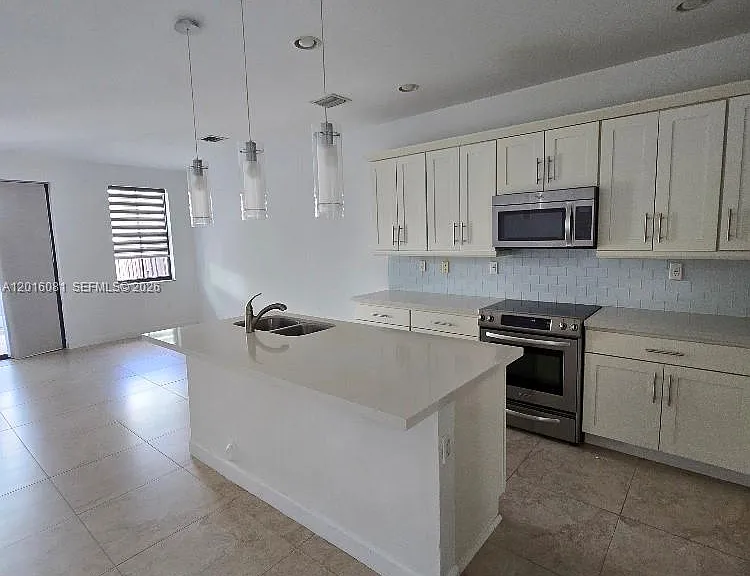 5810 NW 104th Path #5810 — Photo 9