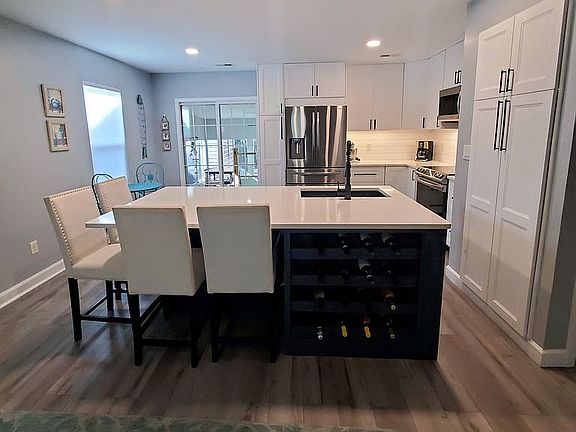 Eat at island with wine rack