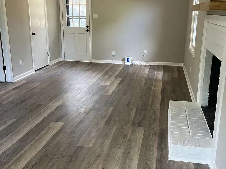 Lower level large family room with back entrance.