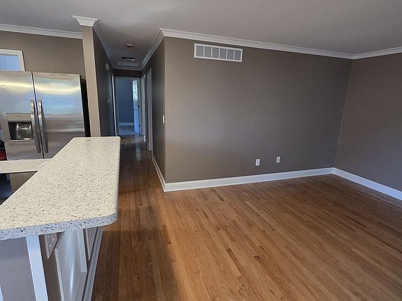 Living room with bar top from kitchen island
