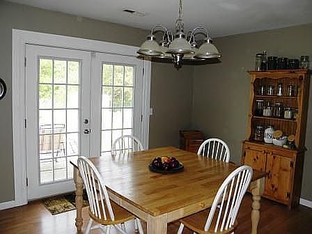 DOUBLE French Doors open to the large fenced backyard