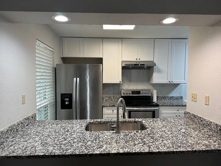 Kitchen and Bar area as viewed from Living Room