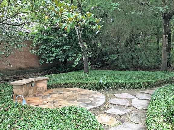 Close-up of flagstone walkways, patio & bench