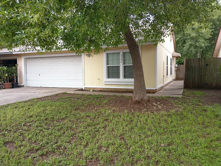 Front Yard with Gated Side Entrance