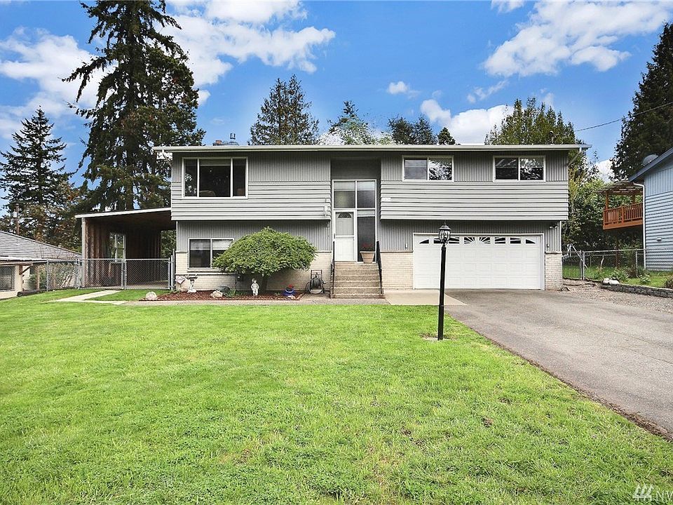 Well maintained home on a huge level lot. 