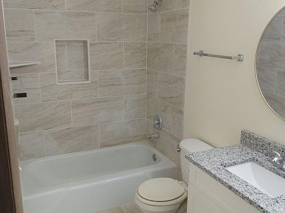 Marble Shower, granite tops, double vanity
