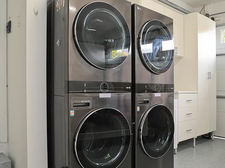 Double LG washer/dryer in garage