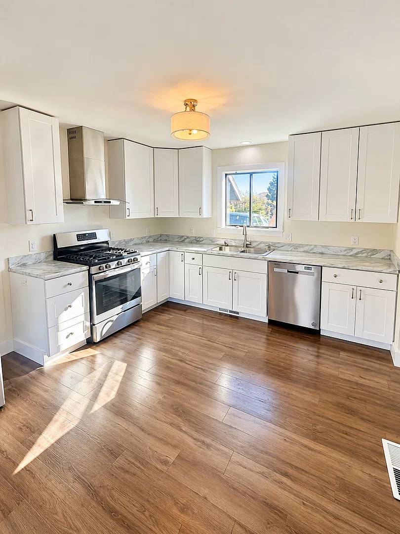 Spacious 3-Bedroom Home with Updated Kitchen, 2-Car Garage & Large Fenced Yard! — Photo 1