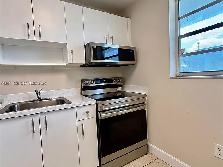1755 W 60th St #D312 — Photo 11