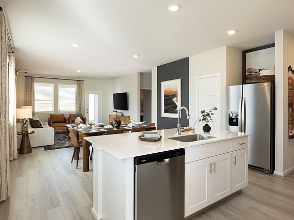 HOU_SanfordEstates_326_Mesa Verde_Kitchen Dining Living Room_17411 Sanford Estates Court_Model.