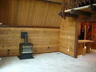 Propane stove in living room warms up the house nicely on cold winter days.