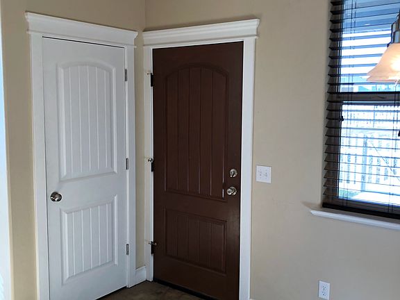 Front door & coat closet