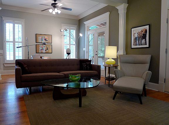 Oversized living room with extra space for sitting area featuring built-in