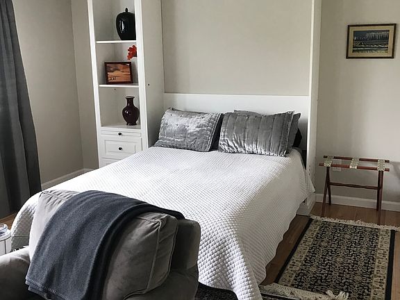 View of Murphy open with bed down. All bedding included.