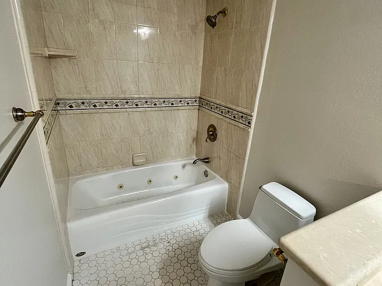 master bathroom with jetted tub