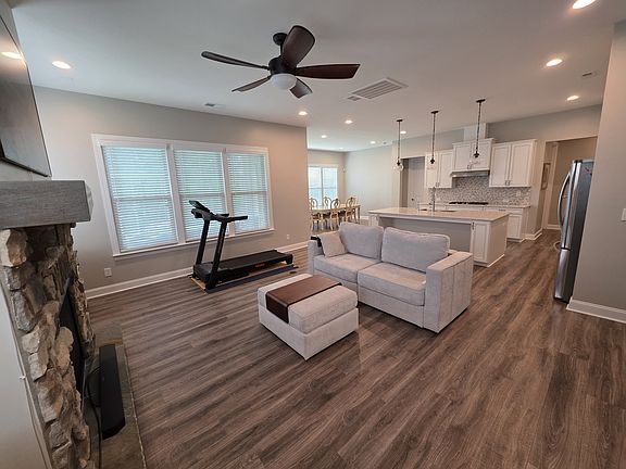 living room. open concept to kitchen and dining area