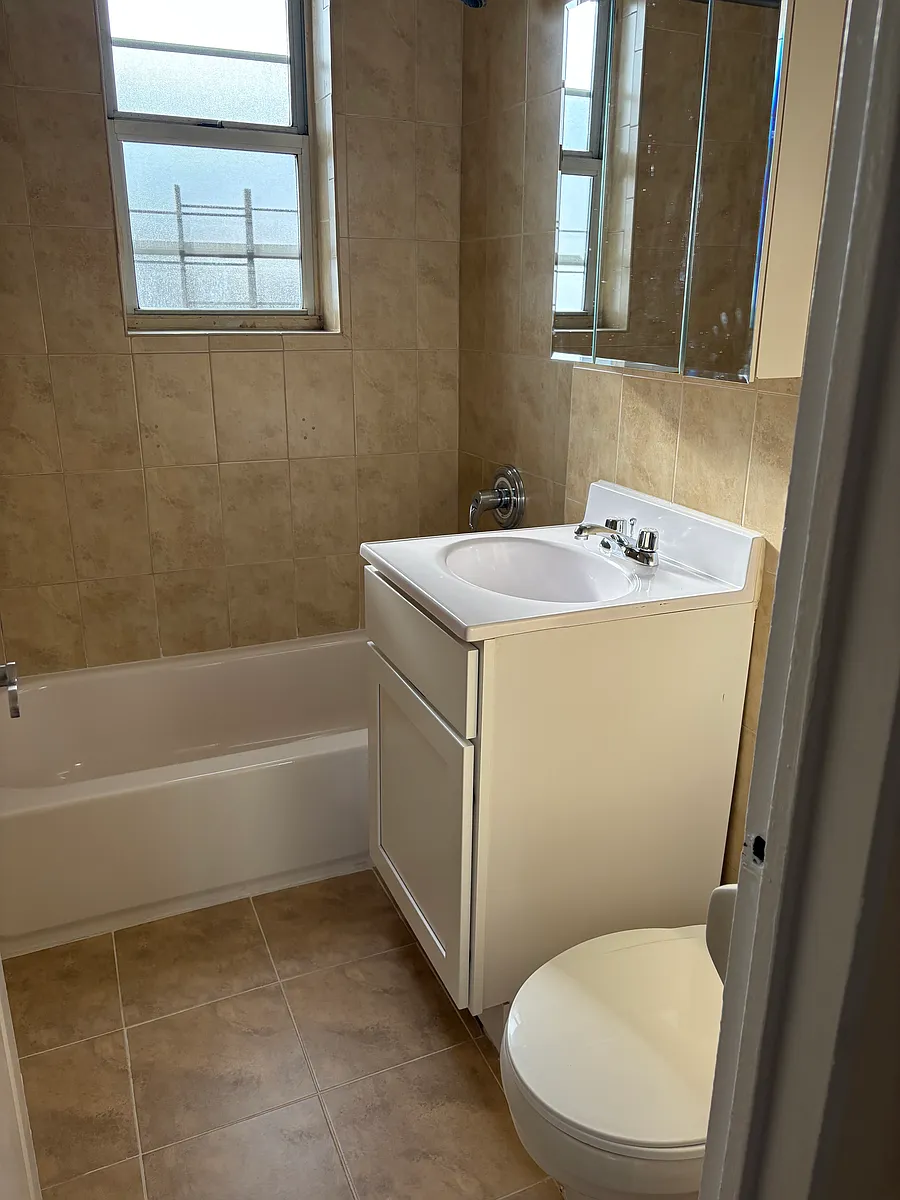 Building Photo - 1487 Shore Pkwy #2D