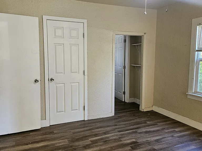Large bedroom with walk through to bathroom