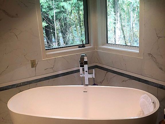 Granite tub +porcelain tiles