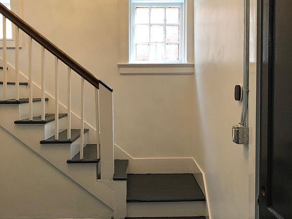 Entryway windows and steps opens into large Foyer with acces