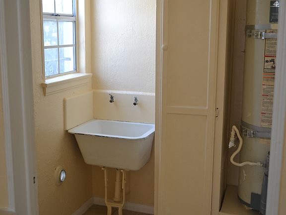 Inside unit laundry room w/ hookups