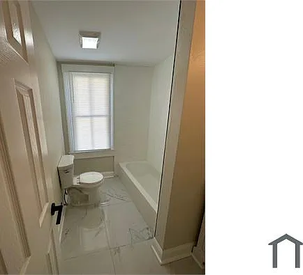 107 E 9th St — Photo 13