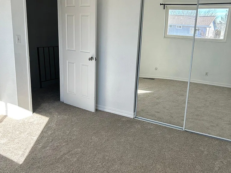 Room one/mirrors are sliding doors to the closet.