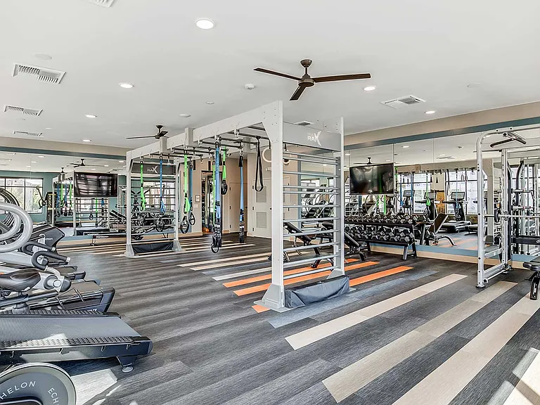 The Wright's modern fitness center features cardio equipment, strength training stations, and functional workout spaces designed to support your daily routine.