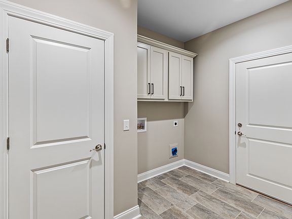 Laundry Room. These photos are for example purposes only. Not exact depiction of floorplan for sale.