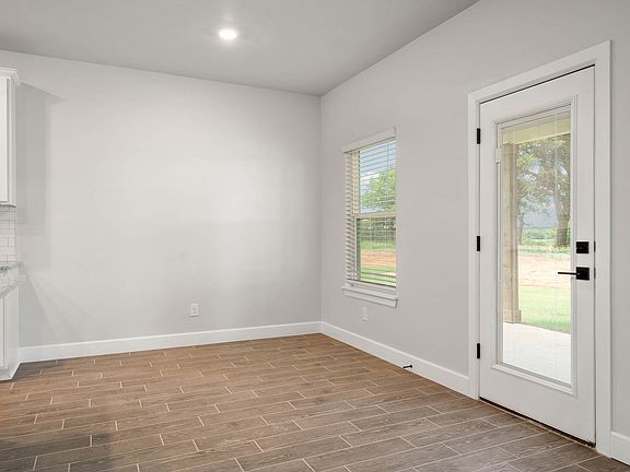 The kitchen has energy-efficient, stainless-steel appliances.