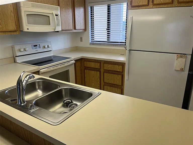 3111 Pass A Grille Way #109R — Photo 3