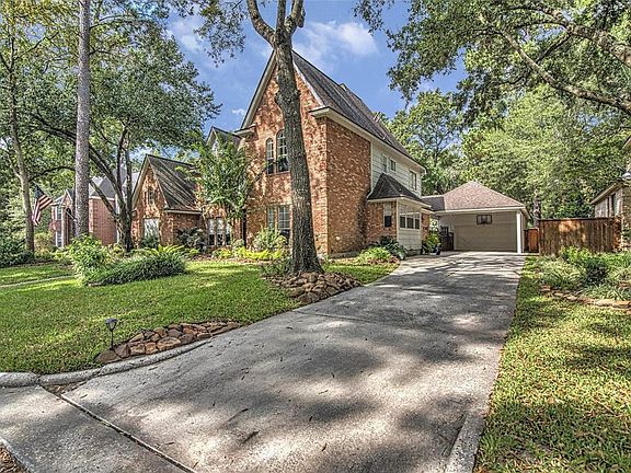 Long driveway, 2 car carport and 2 car garage
