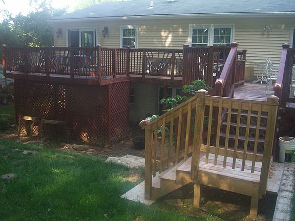 Two side deck; one side opens from master, other side has built in grill/prep 