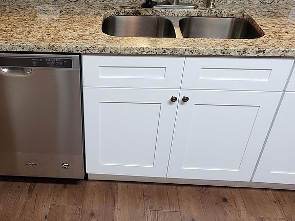 New Dishwasher with granite countertops and upgraded faucet