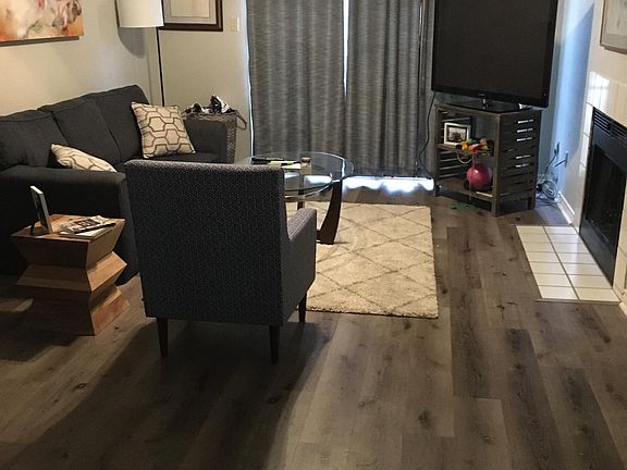 Living room curtains across balcony door included.