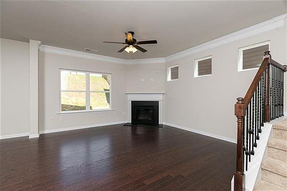 MODEL HOME PICTURED - Actual home has no fireplace for added space in the living room