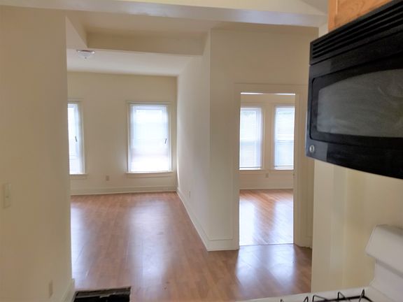 2nd image of 21 E 18th Ave APT C