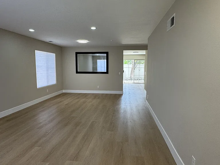 living room into kitchen and family room inside
