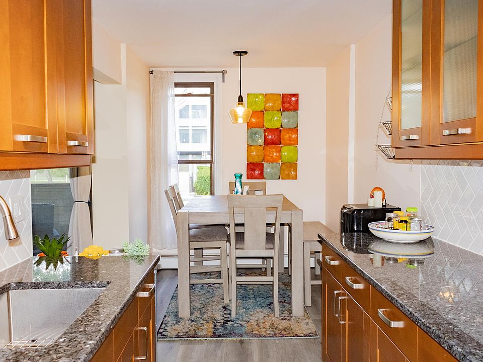 Dining area can fit certain 6-person tables.