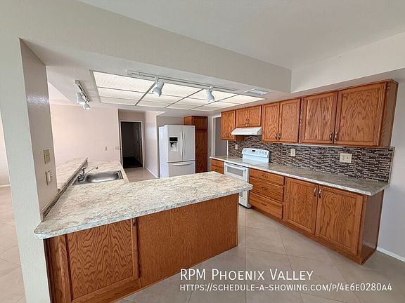 5th image of 9867 W Picacho Ct